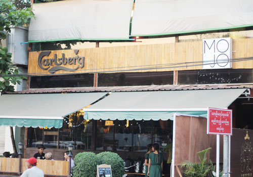 Myanmar. MoJo reopens with Carlsberg branding
